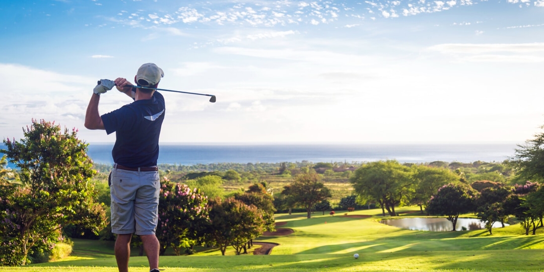 person golfing