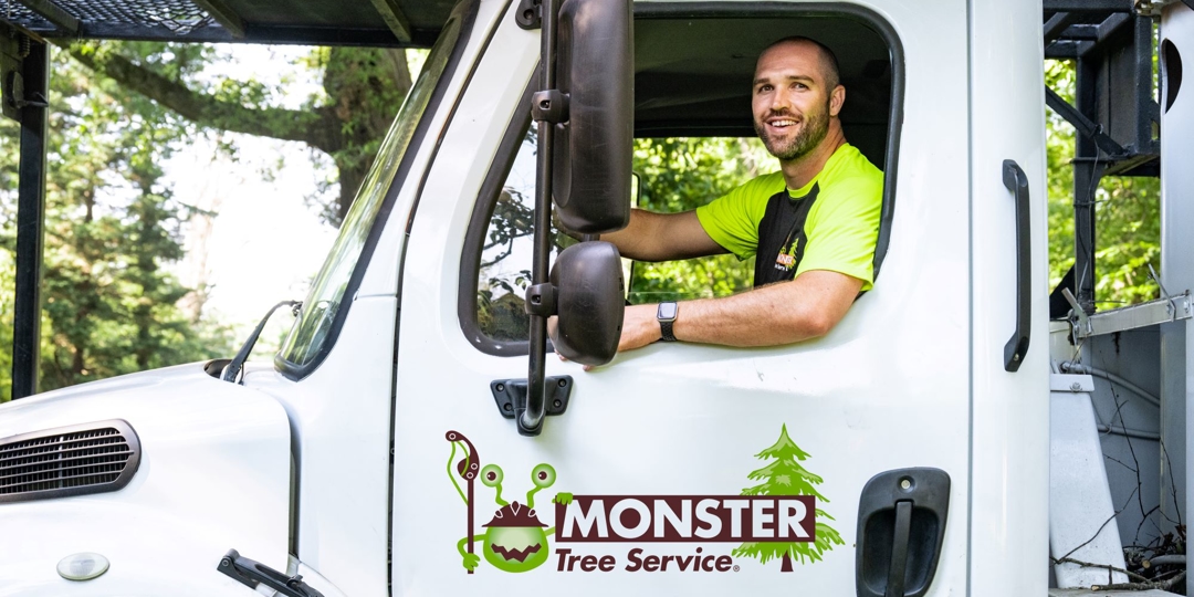 Monster Tree franchise owner in branded truck.